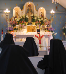 Sisters praying in Chapel
